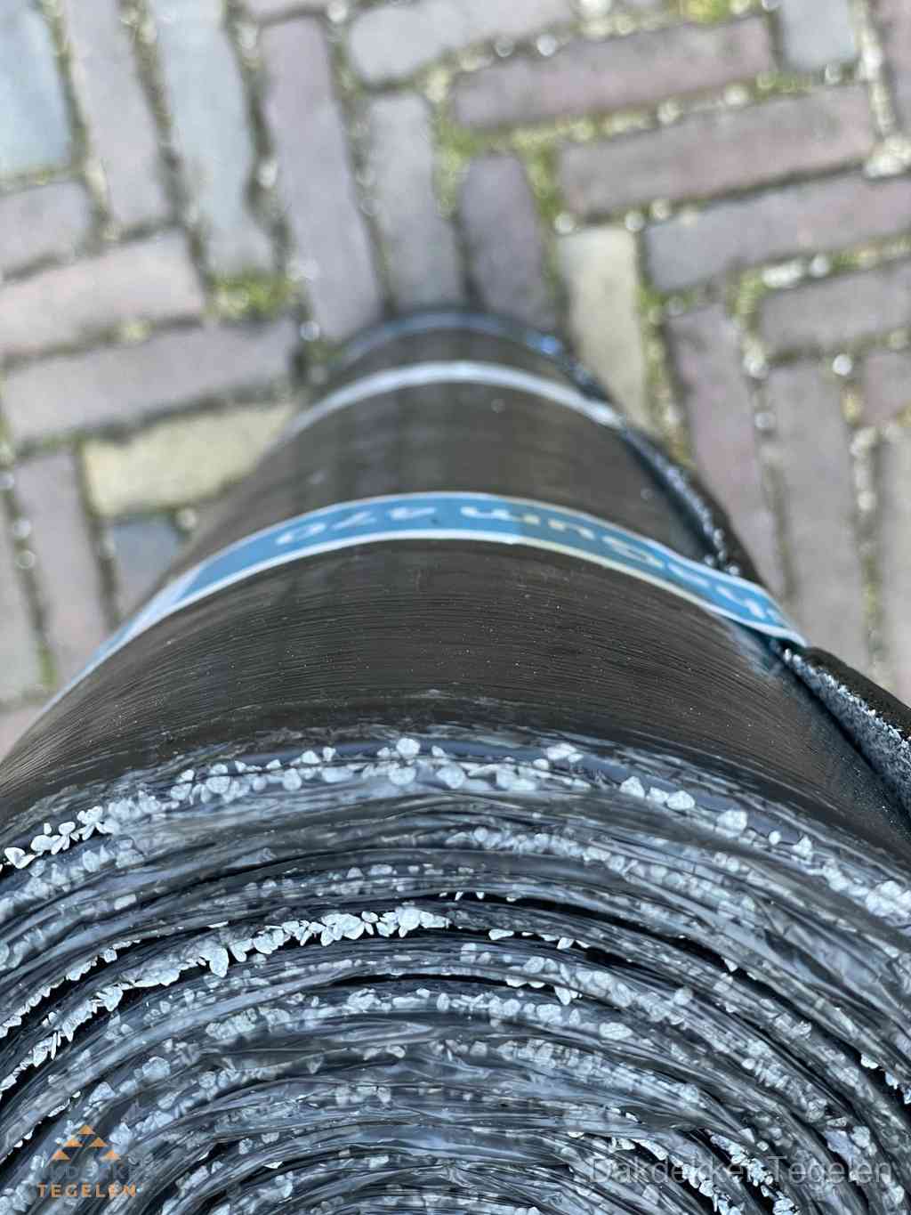 Rol bitumen dakleer met leislag voor plat dak in Tegelen